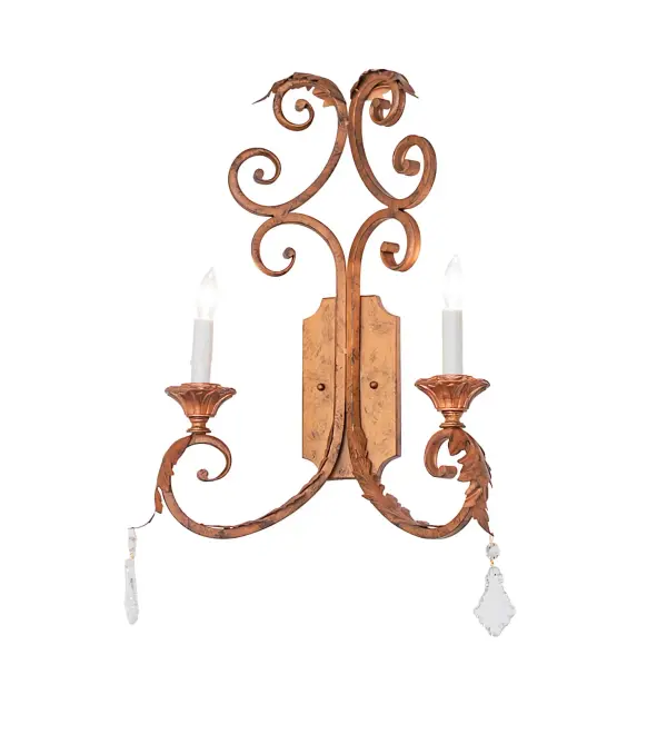 The Serratina Wall Sconce defines unsurpassed elegance, grace, and beauty. With a shapely frame and hardware in an exquisite Spanish Gold finish, Hand-Forged Iron Scrollwork, Crystal Pendalogs, and Acanthus Leaf metal accents complement 2 Ivory faux candlelights, creating beautiful ambient illumination. The luxurious wall luminaire will add sophisticated sparkle and romantic charm to any room. The fixture is ideal for illuminating walls in fine homes and hotels from Fayetteville, North Carolina, to Modesto, California, to Tacoma, Washington. The Serratina 2 Light Wall Sconce is included in our American-made, American-designed, handcrafted Traditional Lighting Collection and manufactured in Yorkville, New York. The fixture is UL and cUL listed for dry and damp locations. Collection: Serratina Finish: Spanish Gold Width: 16.00" Height: 23.00" Length: 6.00" Weight: 6.00 lb Number of Bulbs: 2 Maximum Wattage: 60.00 W Bulb Type: BA9 Bulb Base: E12 Material: Steel/Crystal Country of Origin: USA Safety Rating: Damp