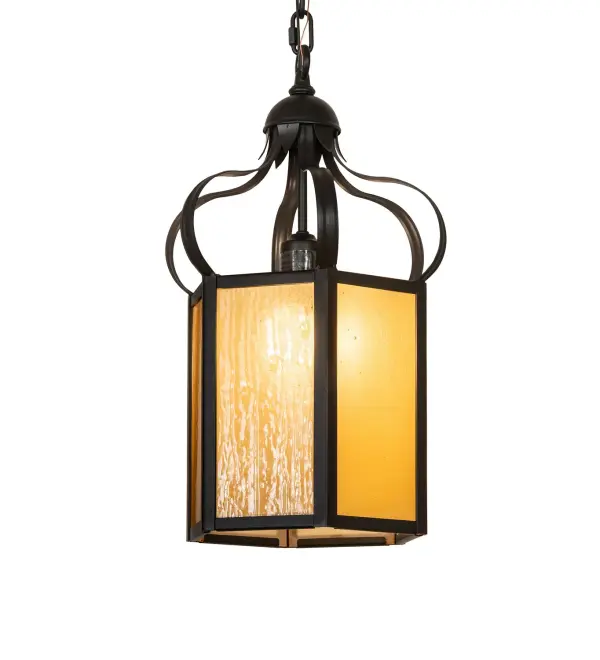 Offering a classic lighting design with beautiful art glass This ceiling pendant is crafted with six panels of Frosted Seeded Amber Glass that diffuse beautiful ambient lighting. The fixture is finished in a bold Solar Black. The overall height ranges from 24 to 98 inches, as the chain length can be easily adjusted in the field to meet your exact specifications. The pendant is ideal for illuminating dining areas and living spaces for houses of worship, homes, hotels, and restaurants. The Mount Carmel Chapel Pendant is included in our American-made, American-designed, handcrafted Transitional Lighting Collection, which is manufactured in Yorkville, NY. UL and cUL are listed for dry and damp locations and featured in Mount Carmel Chapel in La Plata, Maryland. Collection: Mt. Carmel Chapel Finish: Solar Black Glass: Frosted/Seeded Amber Glass Width: 12.00" Height: 24.00" Length: 12.00" Weight: 11.00 lb Number of Bulbs: 1 Maximum Wattage: 60.00 W Bulb Type: A19 Bulb Base: E26 Material: Steel Country of Origin: USA Safety Rating: Damp
