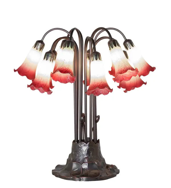 Recreating the famous Tiffany design from the early 1900s. This resplendent table lamp features 12 stunning shades created of Seafoam and Cranberry Favrile-style art glass. An elegant metal base with floral accents is finished by hand in Mahogany Bronze. This lamp is ideal for illuminating picture windows; dining areas; and living spaces in fine homes and hotels from Cheektowaga; New York; to Warwick; Rhode Island. The Seafoam/Cranberry Tiffany Pond Lily 12 Light Table Lamp is featured in our American-designed; handcrafted Favrile Glass Lighting Collection. UL and cUL listed for dry locations. Each shade is a unique work of art with color variations based on natural ingredients inherent in the glass.