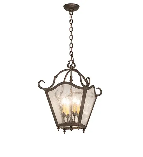 Expert craftsmanship comes to life with a stunning classic lantern design that entices. The exquisite pendant features a Clear Seeded Glass lens revealing 4 Ivory faux candlelights illuminating from within. The lantern is enhanced with a frame and hardware offered in a Gilded Tobacco finish. The overall height of the fixture ranges from 26 to 73 as the chain easily adjusts in the field. The fixture is ideal for placement in homes and restaurants from Overland Park; Kansas; to Garden Grove and Santa Clarita; California. The Terena Marin Pendant is included in our American-made; American-designed; handcrafted Traditional Lighting Collection. It is manufactured in Yorkville; New York. The fixture is UL & cUL listed for dry and damp locations. - alternate view