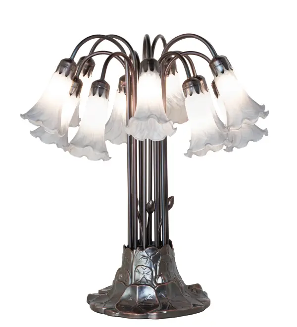 Recreating the famous Tiffany design from the early 1900s. This resplendent table lamp features 12 stunning shades created of Gray Favrile-style art glass. An elegant metal base with floral accents is finished by hand in Mahogany Bronze. This lamp is ideal for illuminating picture windows; dining areas; and living spaces in fine homes and hotels from Cheektowaga; New York; to Warwick; Rhode Island. The Gray Tiffany Pond Lily 12 Light Table Lamp is featured in our American-designed; handcrafted Favrile Glass Lighting Collection. UL and cUL listed for dry locations. Each shade is a unique work of art with color variations based on natural ingredients inherent in the glass.