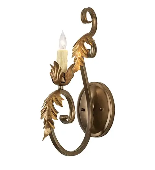 Offering luxurious charm and elegance, Josephine features an exquisite wall sconce design with Acanthus leaf accents in a stunning Aztec Gold finish and a Hand-forged scrolled arm in Black Hills Gold. The elegant wall fixture reveals a single Ivory faux candlelight perched on a floral bobeche for beautiful ambient illumination. The wall sconce beautifully illuminates dining areas and entryways in fine homes and restaurants from Ann Arbor, Michigan, to Springfield, Illinois, to Berkeley, California. The Josephine Wall Sconce is included in our American-made, American-designed, handcrafted Traditional Lighting Collection and manufactured in Yorkville, NY. It is UL and cUL listed for dry and damp locations. Collection: Josephine Finish: Black Hills Gold/Aztec Gold Width: 5.00" Height: 18.00" Length: 12.00" Weight: 3.00 lb Number of Bulbs: 1 Maximum Wattage: 60.00 W Bulb Type: BA9 Bulb Base: E12 Material: Steel Country of Origin: USA Safety Rating: Damp - alternate view