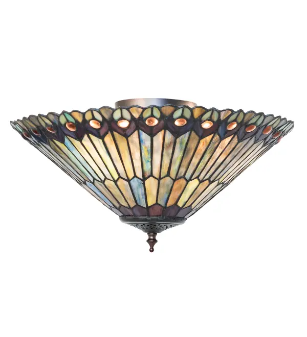As distinctive as beautiful Peacock fanning feathers in the wild; no two shades will ever be the same as their individuality can be as remarkably unique as their personality. This artistic creation utilizes swirling opalescent art glass background combinations; including Beige; Yellow Pinks; Golden Greens; Ivories; Bluish Whites; Turquoise Blues; and Olive and Spring Greens. The eye of the plumage design reveals purple; Pastel Blues; Teals; Cobalt; and ivory; accented with Blue and Purple colored jewels. Individual pieces of glass are hand-cut and wrapped using the famous Meyda Tiffany copperfoil construction technique. The ceiling fixture is enhanced with elegant cast metal hardware hand-finished in Mahogany Bronze. To create a dramatic design statement; install this flushmount in hallways; dining areas and other spaces in residential; commercial; and hospitality settings from Savannah; Georgia; to Montgomery; Alabama; to Huntington Beach; California. The Tiffany Jeweled Peacock Flushmount is included in our American-designed; handcrafted Tiffany Reproduction Collection. UL and cUL listed for dry and damp locations. Each shade is a unique work of art with color variations based on natural ingredients inherent in the glass.
