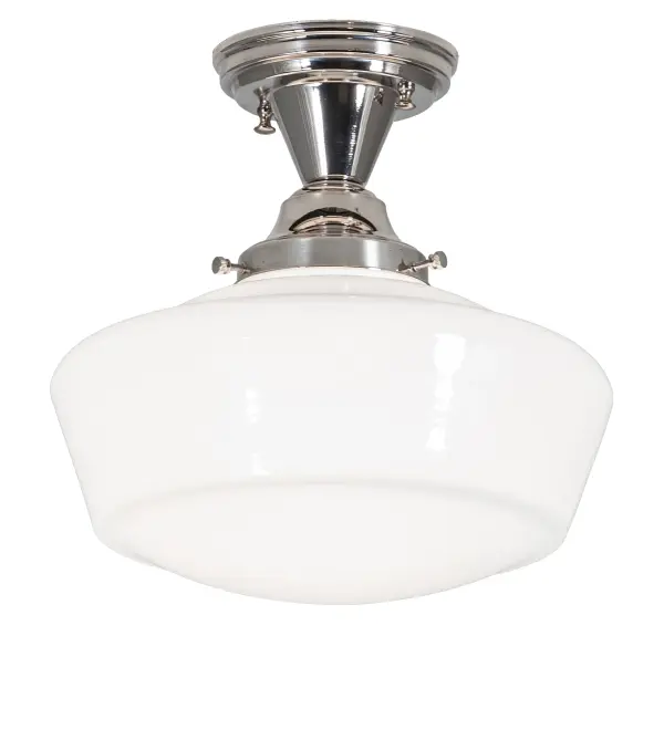 Restore the past with this handsome pendant featuring a beautifully formed White Opal Schoolhouse Glass shade. The fixture is enhanced with Solid Brass hardware featuring a Nickel-plated, Hand-Polished Premium Finish. This vintage-style lighting fixture features a refined yet consistent, distinctive design that originated in traditional schoolhouses and public buildings in the early 1920s. The ceiling fixture is perfect for dining spaces and corridors in structures from Wells, Maine, to Columbia County, New York, to Canaan, Pennsylvania. The Revival Schoolhouse Traditional Globe Semi-Flushmount is included in our American-designed, handcrafted Schoolhouse Lighting Collection. The fixture is UL & cUL listed for dry and damp locations. Collection: Revival Finish: Polished Nickel Glass: White Opal Glass Width: 12.00" Height: 12.00" Length: 12.00" Weight: 4.50 lb Number of Bulbs: 1 Maximum Wattage: 60.00 W Bulb Type: A19 Bulb Base: E26 Material: Brass Country of Origin: USA Safety Rating: Damp