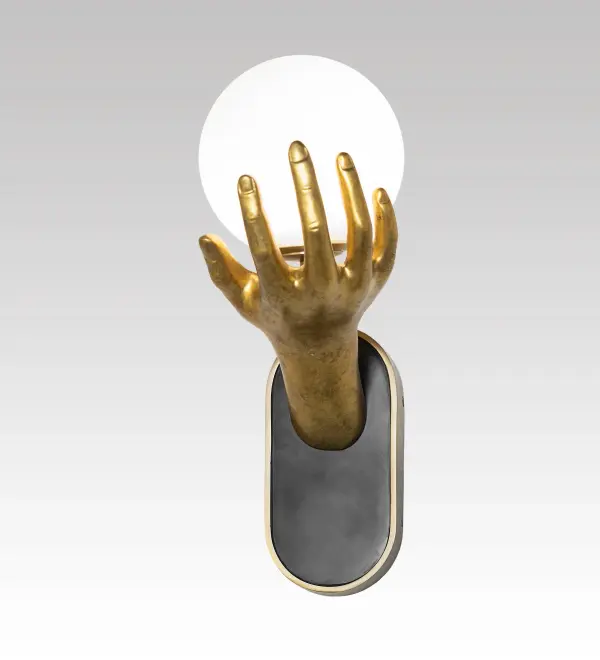 A gripping lighting design; like something from out of Hollywood; a large Aged Brass Hand is featured gripping a Frosted White Glass orb. This jaw-dropping wall fixture is ideal for mancaves; corridors; concourses; and lobbies in residential and hospitality spaces. The Gunter Palma Wall Sconce is included in our American-designed; handcrafted Modern Lighting Collection. It is UL and cUL listed for dry and damp locations. This fixture is Custom Made. Please call for lead time and pricing. This fixture is featured at the Gunter Hotel in San Antonio; Texas. It was purchased by Jaguar Hospitality of Plano; Texas; and designed by DLR Group in New York City.