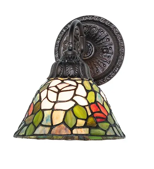 The most beloved of all floral beauties. The Rosebush is beautifully represented in this stunning reproduction of a Tiffany Studio Classic. Petal Pink, Romantic Red, and Beautiful Blue art glass Roses ramble on a maze of Garden Green leaves. The luxurious shade is created using the famous Meyda Tiffany copperfoil construction and paired with an elegant cast metal arm and wall plate featured in a Mahogany Bronze finish. The wall fixture is ideal for illuminating walls in hallways and dining spaces in homes from Boston, Massachusetts, to Des Moines, Iowa, and Seattle, Washington. The Tiffany Rosebush Wall Sconce is included in our American-designed, handcrafted Tiffany Stained Glass Collection. UL & cUL listed for dry and damp locations. Each shade is a unique work of art with color variations based on natural ingredients inherent in the glass. Collection: Tiffany Rosebush Finish: Mahogany Bronze Glass: Stained Glass Width: 8.00" Height: 10.00" Length: 8.00" Weight: 4.00 lb Number of Bulbs: 1 Maximum Wattage: 60.00 W Bulb Type: A19 Bulb Base: E26 Material: Steel Country of Origin: CHINA Safety Rating: Damp - alternate view