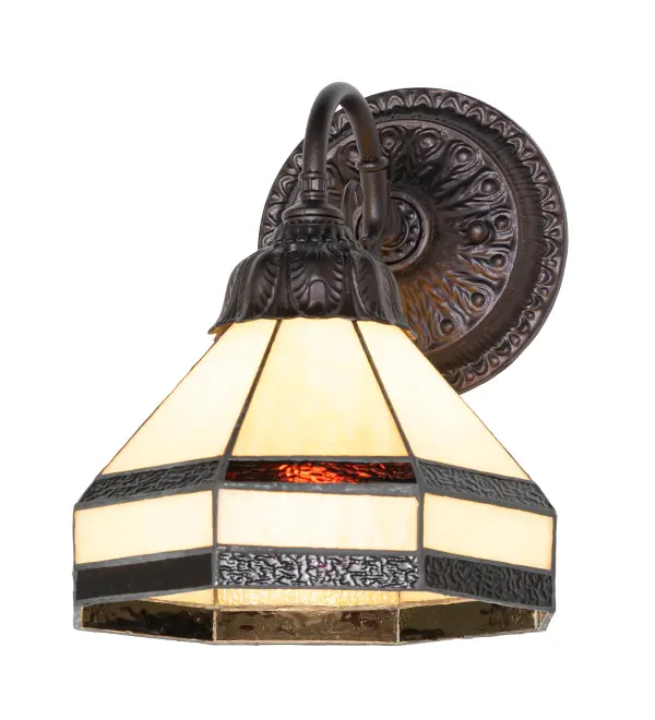 The Topridge lighting design is inspired by Marjorie Merriweather Post's retreat in Paul Smiths, New York, outside Lake Placid, where the 1932 and 1980 Winter Olympics were held. Bark Brown Granite Glass borders this wall sconce's exquisite Beige Stained Glass shade. The classic styling of this Tiffany-inspired wall fixture and soft pastel colors will add charm to any room. The handsome shade is handcrafted using the famous Meyda Tiffany copperfoil construction process. The Topridge Wall Sconce is featured in our American-designed, handcrafted Stained Glass Lighting Collection. UL and cUL listed for dry and damp locations. Each shade is a unique work of art with color variations based on natural ingredients inherent in the glass. Collection: Topridge Finish: Mahogany Bronze Glass: Stained Glass Width: 8.00" Height: 10.00" Length: 8.00" Weight: 4.00 lb Number of Bulbs: 1 Maximum Wattage: 60.00 W Bulb Type: A19 Bulb Base: E26 Country of Origin: CHINA Safety Rating: Damp
