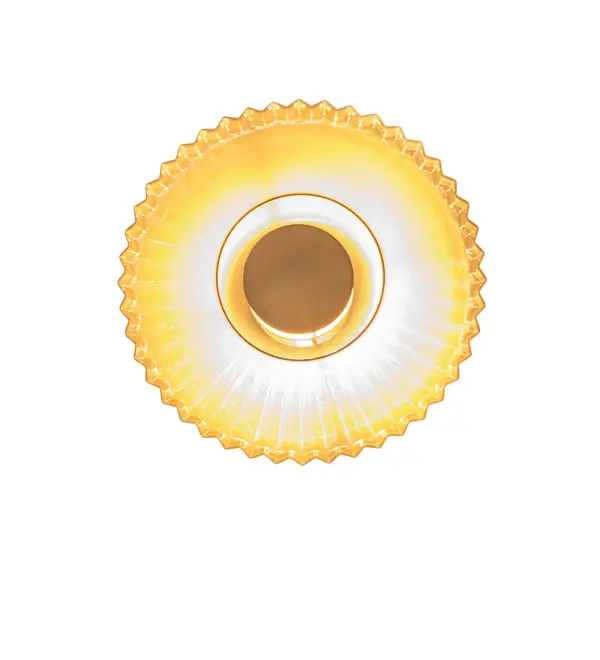 This elegant wall sconce features a brilliant Champagne Iridescent Glass lens for a dramatic look. Integral energy-efficient LEDs deliver beautiful light and emit gorgeous omnidirectional wall striations. The frame and hardware are offered in a stunning Bronze finish. This magnificent wall fixture is ideal for corridors, dining areas, and entryways in residential and hospitality spaces. The Meri Wall Sconce is included in our American-designed, handcrafted Deco Lighting Collection. The fixture is UL and cUL listed for dry and damp locations. It is Custom Made. Please call for lead time and pricing. Collection: Meri Finish: Bronze Glass: Champagne Iridescent Glass Width: 16.00" Height: 16.00" Length: 4.50" Weight: 6.50 lb Maximum Wattage: 20.00 W Bulb Type: LED Bulb Base: INTEGRAL Light Source: LED Color Temperature: 2700 K Material: Steel Country of Origin: CHINA Safety Rating: Damp LED