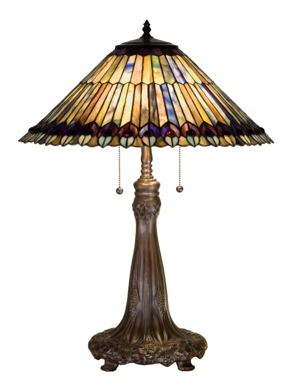 As distinctive as beautiful Peacock fanning feathers in the wild; no two shades will ever be the same as their individuality can be as remarkably unique as their personality. This artistic creation utilizes swirling opalescent art glass background combinations including Beige; Yellow Pinks; Golden Greens; Ivories; Bluish Whites; Turquoise Blues; Olive and Spring Greens. The eye of the plumage design reveals Purples; Pastel Blues; Teals; Cobalt and Ivories; accented with Blue and Purple colored jewels. Individual pieces of glass are hand cut and wrapped using Meyda Tiffany's famous copperfoil construction. Each shade is a unique work of art with color variations based on natural ingredients inherent in the glass. Mahogany Bronze finish.