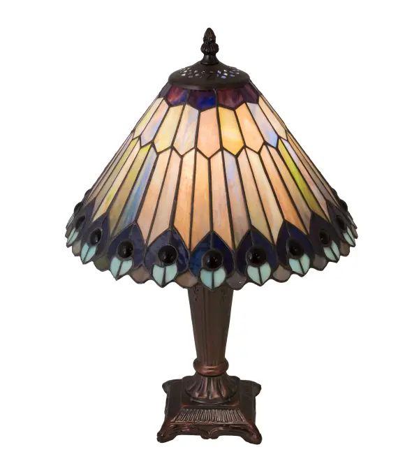As distinctive as beautiful Peacock fanning feathers in the wild; no two shades will ever be the same as their individuality can be as remarkably unique as their personality. This artistic creation utilizes swirling opalescent art glass background combinations including Beige; Yellow Pinks; Golden Greens; Ivories; Bluish Whites; Turquoise Blues; Olive and Spring Greens. The eye of the plumage design reveals Purples; Pastel Blues; Teals; Cobalt and Ivories; accented with Blue and Purple colored jewels. Individual pieces of glass are hand cut and wrapped using Meyda Tiffany's famous copperfoil construction. Each shade is a unique work of art with color variations based on natural ingredients inherent in the glass. Mahogany Bronze finish.
