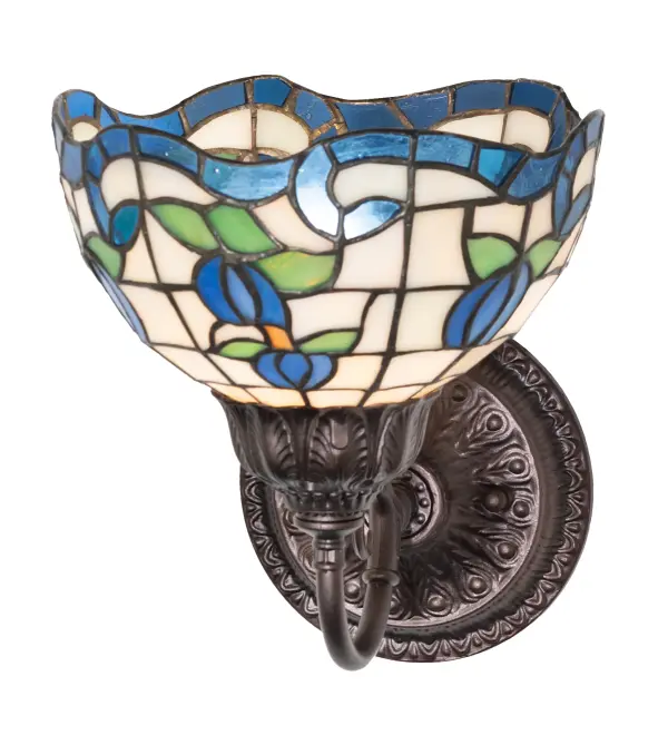 Grace your home with this elegant shade featuring a gridwork of Beige art glass adorned with a Sapphire Blue border of swirling ribbons and Blue rosebuds with Spring Green Leaves. Crafted of hand-cut art glass using the famous Meyda Tiffany copperfoil construction process and complemented with ornate cast hardware in a Mahogany Bronze finish and inspired by famous rose gardens in the New York Botanical Garden in Bronx Park, New York City, to the White House in Washington, D.C. The fixture is ideal for placement in hallways and dining areas to create a beautiful design statement. The Roseborder Wall Sconce is featured in our American-designed, handcrafted Stained Glass Lighting Collection. UL & cUL listed for dry and damp locations. Each shade is a unique work of art with color variations based on natural ingredients inherent in the glass. Collection: Roseborder Finish: Mahogany Bronze Glass: Stained Glass Width: 7.00" Height: 9.00" Length: 9.00" Weight: 3.00 lb Number of Bulbs: 1 Maximum Wattage: 60.00 W Bulb Type: A15 Bulb Base: E26 Country of Origin: CHINA Safety Rating: Damp
