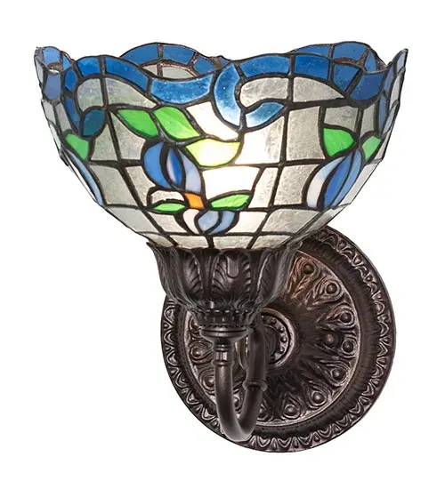Grace your home with this elegant shade featuring a gridwork of Clear art glass adorned with a Sapphire Blue border of swirling ribbons and Blue rosebuds with Spring Green Leaves. Crafted of hand-cut art glass using the famous Meyda Tiffany copperfoil construction process and complemented with ornate cast hardware in a Mahogany Bronze finish and inspired by renowned rose gardens in the New York Botanical Garden in Bronx Park, New York City, to the White House in Washington, D.C. The fixture is ideal for placement in hallways and dining areas to create a beautiful design statement. The Roseborder Wall Sconce is featured in our American-designed, handcrafted Stained Glass Lighting Collection. UL & cUL listed for dry and damp locations. Each shade is a unique work of art with color variations based on natural ingredients inherent in the glass. Collection: Roseborder Finish: Mahogany Bronze Glass: Stained Glass Width: 7.00" Height: 9.00" Length: 9.00" Weight: 3.00 lb Number of Bulbs: 1 Maximum Wattage: 60.00 W Bulb Type: A15 Bulb Base: E26 Country of Origin: CHINA Safety Rating: Damp - alternate view