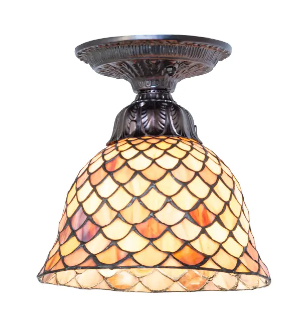 A Louis Comfort Tiffany studio classic... The renowned Fishscale design features a variegated Tortoiseshell of Emerald, Sapphire, Mauve, and Beige-colored stained glass, evoking a unique, dimensional, and textured look in a rainbow of brilliant hues. This exquisite art glass shade is created using the famous Meyda Tiffany copper foil construction process and enhanced with a Mahogany Bronze finish. The overall height can be adjusted by combining the four stem lengths that are included: 6-inch, 12-inch, 16-inch, and 24-inch, in any combination to achieve the desired drop from the ceiling. The Tiffany Fishscale Flush Mount is included in our American-designed, handcrafted Tiffany Reproduction Lighting Collection. It is UL and cUL listed for dry and damp locations. Each shade is a unique work of art with color variations based on natural ingredients inherent in the glass. Collection: Tiffany Fishscale Finish: Mahogany Bronze Glass: Stained Glass Width: 8.00" Height: 8.00" Length: 8.00" Weight: 3.00 lb Number of Bulbs: 1 Maximum Wattage: 60.00 W Bulb Type: A19 Bulb Base: E26 Material: Steel Country of Origin: CHINA Safety Rating: Damp