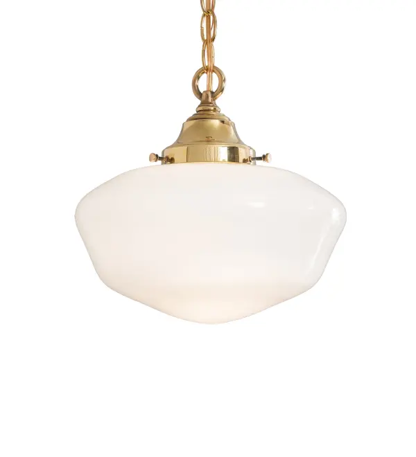 Restore the past with this appealing ceiling pendant featuring a beautifully formed White Opal Schoolhouse Glass shade. The fixture is enhanced with Solid Brass hardware featuring a Hand-Polished Premium Finish. This vintage-style lighting fixture offers a refined yet consistent, distinctive design that originated in traditional schoolhouses and public buildings in the early 1920s. The ceiling fixture is perfect for dining spaces and corridors in structures from Wells, Maine, to Columbia County, New York, to Canaan, Pennsylvania. The overall height ranges from 17 to 52 inches, as the chain can be easily adjusted in the field. The Revival Schoolhouse Traditional Globe Pendant is included in our American-designed, handcrafted Schoolhouse Lighting Collection. The fixture is UL & cUL listed for dry and damp locations. Collection: Revival Finish: Polished Brass Glass: White Opal Glass Width: 12.00" Height: 17.00" Length: 12.00" Weight: 6.00 lb Number of Bulbs: 1 Maximum Wattage: 60.00 W Bulb Type: A19 Bulb Base: E26 Material: Brass Country of Origin: USA Safety Rating: Damp