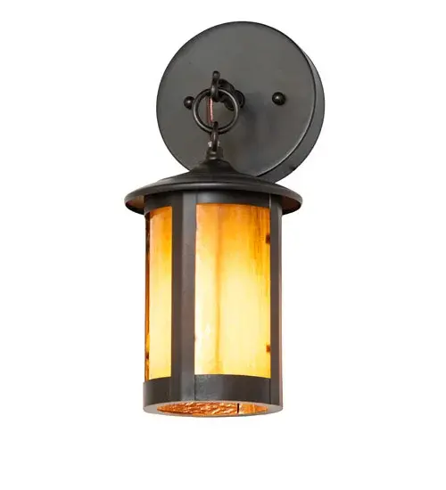 Handcrafted from Solid Brass with alluring rustic beauty. This stunning Craftsman Signature lantern features a Honey Ripple Art Glass lens enhanced with a Craftsman Brown finish. Display this wall sconce to illuminate the exterior of timber homes, modern farmhouses, and other spaces. The Fulton Prime Wall Sconce is included in our American-made, American-designed, handcrafted Craftsman Signature Series, manufactured in Yorkville, New York. UL and cUL listed for dry, damp, and wet locations. Our Build Your Own Craftsman Signature Series features unlimited combinations of styles. The collection is called Build Your Own because it is fully configurable and customizable from size and design to finish and lens color. Marine grade, solid brass, or copper raw materials are utilized to ensure items from the Craftsman Signature Series of outdoor and indoor lighting will stand the test of time, as these premium metals are impervious to most types of oxidation. Hand-applied Patina finishes on brass and copper are sealed with a clear varnish and over time, may require gentle maintenance, such as wax, to delay or reverse the natural living finish attributes indicative of this finishing process. Patina finishes on brass and copper provide strong resistance to fading from sun exposure, will not chip or crack, and will not rust like a steel-framed item in the same conditions. Choose from many style options, or send us your concept today! Call today to learn how to use the configuration tool available on our website for an instant item number! Collection: Fulton Finish: Craftsman Brown Glass: Honey Ripple Art Glass Width: 5.00" Height: 12.00" Length: 5.00" Weight: 2.00 lb Number of Bulbs: 1 Maximum Wattage: 60.00 W Bulb Type: T10 Bulb Base: E26 Material: Brass Country of Origin: USA Safety Rating: Wet - alternate view