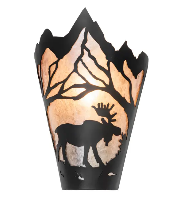 This nature-inspired wall sconce depicts a majestic Moose meandering through an enchanting forest as the early morning mist begins to clear during the beautiful spectacle of the rising sun. A power animal symbolizing confidence, wisdom, longevity, and steadfastness, the Moose is portrayed in all its glory in a Solar Black finish. The stunning shade features a beautiful Silver Mica lens that is enhanced with the dramatic Moose silhouette. Place the wall sconce to illuminate a hallway or dining area in residences, restaurants, and hotels. This wall fixture is complemented with the matching Moose at Dawn Left Wall Sconce, model 274655. The Moose at Dawn Wall Sconces are included in the American-made, American-designed, handcrafted Wildlife Collection, which is manufactured in Yorkville, New York. The fixture is UL and cUL listed for dry and damp locations. Collection: Moose At Dawn Finish: Solar Black Glass: Silver Mica Width: 8.00" Height: 12.00" Length: 5.00" Weight: 2.50 lb Number of Bulbs: 1 Maximum Wattage: 60.00 W Bulb Type: T10 Bulb Base: E26 Material: Steel Country of Origin: USA Safety Rating: Damp