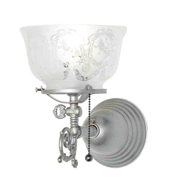 Every Meyda Tiffany item is a unique handcrafted work of art. Natural variations in the wide array of materials that we use to create each Meyda product make every item a masterpiece of its own. Photographs are a general representation of the product. Colors and designs will vary. Collection: Revival Finish: Light Sandstone Glass: Clear & Frosted Glass Width: 7.00" Height: 10.00" Length: 11.00" Weight: 2.00 lb Number of Bulbs: 1 Maximum Wattage: 60.00 W Bulb Type: G16.5 Bulb Base: E26 Material: Steel Country of Origin: USA Safety Rating: Damp