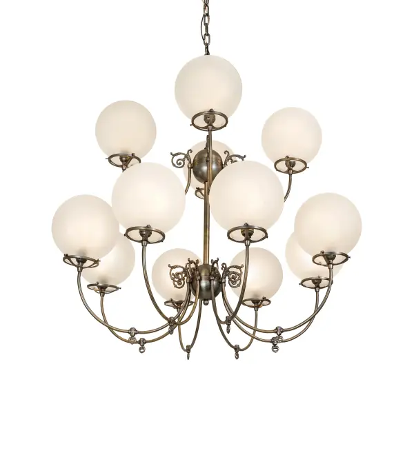 Combining the revival look of gas and electric reproductions, this magnificent chandelier offers an eye-catching look with 12 stunning Globe-styled elements offered in Clear Frosted Glass. An elegant frame, hardware, and scrollwork are featured in a luxurious Antique Brass. The decorative accents resemble authentic paddle switches used in antique lighting. The chandelier is ideal for illuminating lobbies and patron service areas in restaurants and retailers. The overall height of this pendant ranges from 38 to 84 inches, as the chain length can be easily adjusted on location to accommodate your specific lighting application needs. The Revival Gas & Electric 12 Light Chandelier is included in our American-designed handcrafted Revival Collection. UL and cUL are listed for dry and damp locations. The fixture is featured in the Splendid Restaurant in New York City and was specified by Cassidy Renee Studios. Collection: Revival Finish: Antique Brass Glass: Clear Frosted Glass Width: 40.00" Height: 38.00" Length: 40.00" Weight: 42.00 lb Number of Bulbs: 12 Maximum Wattage: 60.00 W Bulb Type: A19 Bulb Base: E26 Material: Brass Country of Origin: USA Safety Rating: Damp