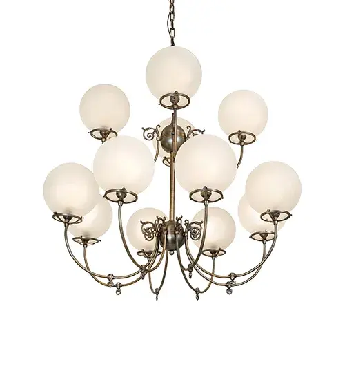 Combining the revival look of gas and electric reproductions, this magnificent chandelier offers an eye-catching look with 12 stunning Globe-styled elements offered in Clear Frosted Glass. An elegant frame, hardware, and scrollwork are featured in a luxurious Antique Brass. The decorative accents resemble authentic paddle switches used in antique lighting. The chandelier is ideal for illuminating lobbies and patron service areas in restaurants and retailers. The overall height of this pendant ranges from 38 to 84 inches, as the chain length can be easily adjusted on location to accommodate your specific lighting application needs. The Revival Gas & Electric 12 Light Chandelier is included in our American-designed handcrafted Revival Collection. UL and cUL are listed for dry and damp locations. The fixture is featured in the Splendid Restaurant in New York City and was specified by Cassidy Renee Studios. Collection: Revival Finish: Antique Brass Glass: Clear Frosted Glass Width: 40.00" Height: 38.00" Length: 40.00" Weight: 42.00 lb Number of Bulbs: 12 Maximum Wattage: 60.00 W Bulb Type: A19 Bulb Base: E26 Material: Brass Country of Origin: USA Safety Rating: Damp - alternate view