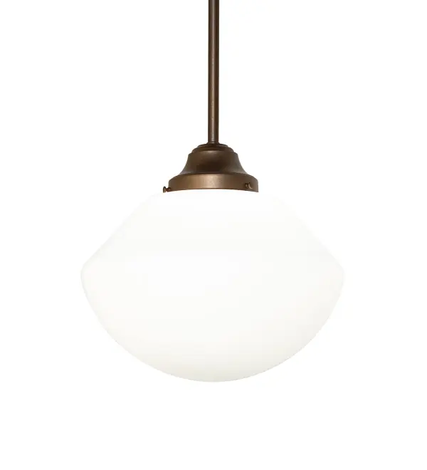 Restore the past with this appealing ceiling fixture featuring a beautifully formed White Opal Schoolhouse Glass shade with a traditional globe profile and complemented with a Tyler Bronze finish. This vintage-style fixture offers a refined yet consistent, distinctive design that originated in traditional schoolhouses and public buildings in the early 1920s. The Brass pendant is perfect for dining spaces and corridors in homes, restaurants, and other public spaces. The Revival Schoolhouse Traditional Globe Pendant is included in our American-designed, handcrafted Schoolhouse Lighting Collection. The fixture is UL and cUL listed for use in dry and damp locations. Collection: Revival Finish: Tyler Bronze Glass: White Opal Glass Width: 12.00" Height: 42.00" Length: 12.00" Weight: 4.00 lb Number of Bulbs: 1 Maximum Wattage: 60.00 W Bulb Type: A19 Bulb Base: E26 Material: Brass/Steel Country of Origin: USA Safety Rating: Damp