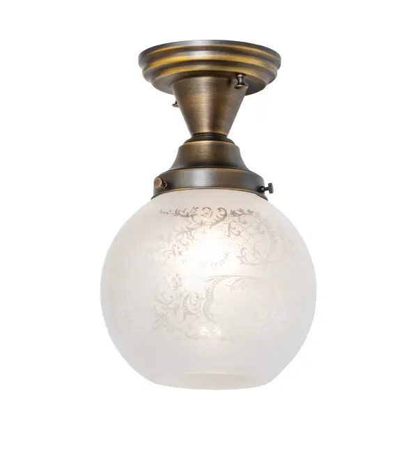 Restore the past with this always fashionable; early electric reproduction Vivianna ceiling fixture. The handsome fixture features Antique Brass hardware and is enhanced with a beautiful Clear Etched Glass globe-style shade. This vintage lighting features a refined yet consistent; distinctive style that originated in traditional schoolhouses and public buildings in the early 1920s. The fixture design is perfect for entryways and lobbies in residential and hospitality locations. The Revival Vivianna Flushmount is included in our American-designed; handcrafted Revival Lighting Collection. It is UL and cUL listed for dry and damp locations.