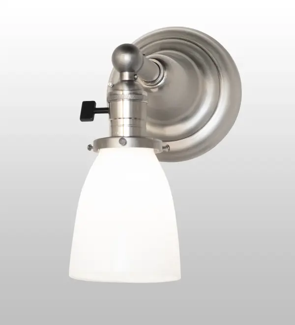 Recreating a golden era of style and charm; this fixture is inspired by Revival-style homes. The exquisite Revival wall fixture impresses with this Oyster Bay Goblet-styled shade in White Opal blown-glass. The shade is embraced by hardware and an authentic traditional paddle switch designed and crafted with the exact details of old-world artisanship. This fixture features a handsome Brushed Nickel finish and is ideal for illuminating walls in corridors and other traditional settings in residential; commercial; and hospitality spaces. The Revival Chelsea Paddle Socket Wall Sconce is included in our American-made; American-designed Revival Lighting Collection and manufactured in Yorkville; New York. UL and cUL listed for dry and damp locations.
