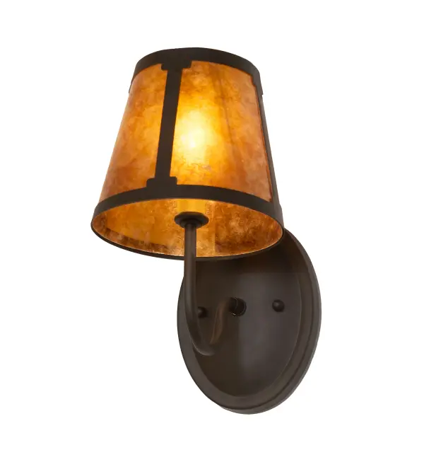 You can elevate your space with this stunning curvaceous wall sconce. Talmont features a sleek Amber Mica shade; which is perched on an Ivory faux candlelight. The minimalist wall fixture is enhanced with a curved arm and a round backplate; both featured in an Oil Rubbed Bronze finish. The mica shade offers a classic; tapered design that renders a handsome look and beautiful ambient illumination. This wall luminaire is ideal for use in hallways; dining areas; and living spaces in residential and hospitality settings. The Talmont Wall Sconce is included in our American-made; American-designed; handcrafted Transitional Lighting Collection and is manufactured in Yorkville; New York. UL and cUL listed for dry and damp locations.