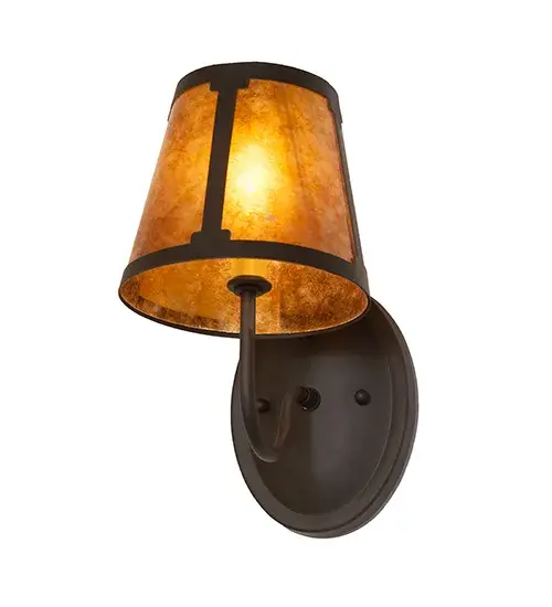 You can elevate your space with this stunning curvaceous wall sconce. Talmont features a sleek Amber Mica shade; which is perched on an Ivory faux candlelight. The minimalist wall fixture is enhanced with a curved arm and a round backplate; both featured in an Oil Rubbed Bronze finish. The mica shade offers a classic; tapered design that renders a handsome look and beautiful ambient illumination. This wall luminaire is ideal for use in hallways; dining areas; and living spaces in residential and hospitality settings. The Talmont Wall Sconce is included in our American-made; American-designed; handcrafted Transitional Lighting Collection and is manufactured in Yorkville; New York. UL and cUL listed for dry and damp locations. - alternate view