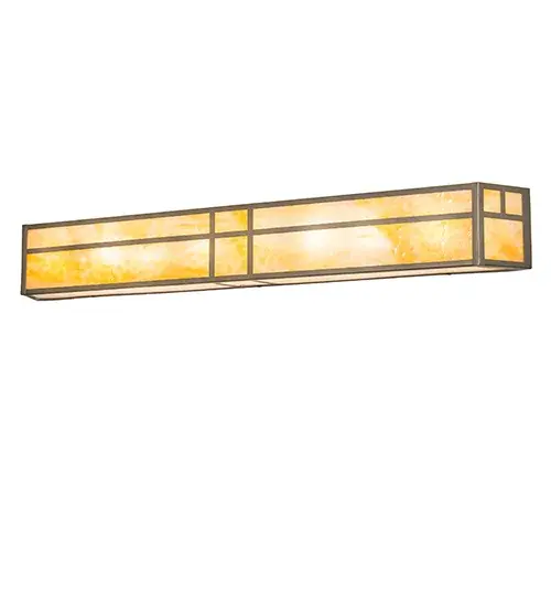 This handsome wall fixture is inspired by the Arts and Crafts movement. The striking Mission straight-line design is featured in Beige Art Glass and enhanced with a Contrail Mist Idalight bottom diffuser. The frame and hardware are featured in a Champagne finish. The fixture is perfect for a vanity light in fine baths or as a wall sconce in corridors in homes and hospitality locations. The Hyde Park Double Cross Mission Vanity Light is included in our American-made; American-designed; handcrafted Craftsman Collection and manufactured in Yorkville; New York. This fixture is UL and cUL listed for dry and damp locations. - alternate view