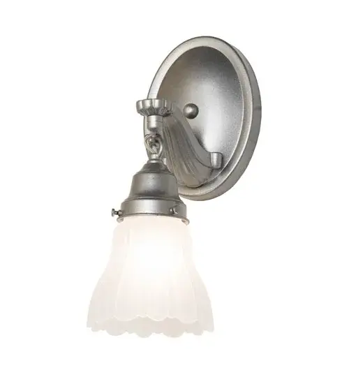 Reminiscent of lighting fixtures from the early 1900s. This timeless wall sconce features a Frosted White Ruffle Glass shade. It is an authentic, historic look to complement any room or space. Authentic decorative accents and hardware details in a Light Sandstone finish make this piece a timeless treasure. Perfect for providing beautiful illumination in dining areas and hallways in residential and hospitality locations. The Hartford Ruffle Wall Sconce is included in our American-designed, handcrafted Revival Lighting Collection. UL and cUL listed for dry and damp locations. Collection: Hartford Finish: Light Sandstone Glass: Frosted White Opal Width: 5.00" Height: 12.50" Length: 6.50" Weight: 2.50 lb Number of Bulbs: 1 Maximum Wattage: 60.00 W Bulb Type: A15 Bulb Base: E26 Material: Brass Country of Origin: CHINA Safety Rating: Damp - alternate view