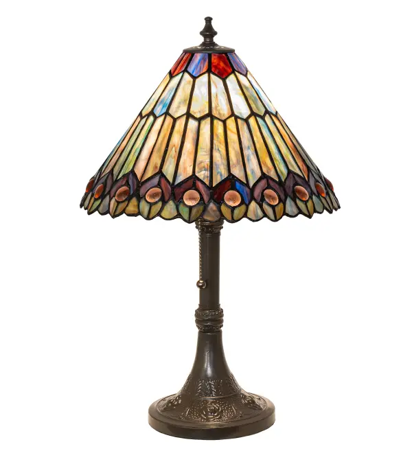 As distinctive as beautiful Peacock fanning feathers in the wild, no two shades will ever be the same as their individuality can be as remarkably unique as their personality. This artistic creation utilizes swirling opalescent stained glass background combinations, including Beige, Yellow Pinks, Golden Greens, Ivories, Bluish Whites, Turquoise Blues, and Olive and Spring Greens. The eye of the plumage design reveals purple, Pastel Blues, Teals, Cobalt, and ivory, accented with Blue and Purple colored jewels. Individual pieces of glass are hand-cut and wrapped using the famous Meyda Tiffany copperfoil construction technique. The table lamp is enhanced with an elegant cast metal base hand-finished in Timeless Bronze. To create a dramatic design statement, place this table lamp in picture windows, on desks, and in credenzas in hallways, dining areas, and other spaces in residential, commercial, and hospitality settings. The Tiffany Jeweled Peacock Accent Lamp is included in our American-designed, handcrafted Tiffany Reproduction Collection. UL and cUL listed for dry locations. Each shade is a unique work of art with color variations based on natural ingredients inherent in the glass. Collection: Tiffany Jeweled Peacock Finish: Timeless Bronze Glass: Stained Glass Width: 12.00" Height: 19.00" Length: 12.00" Weight: 8.00 lb Number of Bulbs: 1 Maximum Wattage: 60.00 W Bulb Type: A15 Bulb Base: E26 Material: Zinc Country of Origin: CHINA Safety Rating: Dry