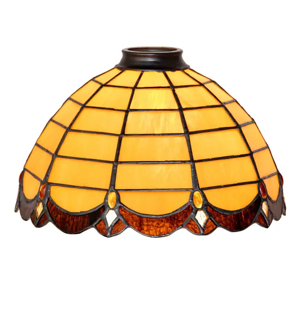 An elegant art glass shade. This Amber stained glass shade trimmed in swooping scallops of Bark Brown Granite Glass is accented by sparkling Amber and Clear jewels. This Art Nouveau-style shade can be used with a base to create a table lamp, or matched with hardware to create a ceiling fixture, mini pendant or wall sconce. The Elan Shade is featured in our American-designed, handcrafted Stained Glass Lighting Collection. Each shade is a unique work of art with color variations based on natural ingredients inherent in the glass. Collection: Elan Glass: Stained Glass Width: 9.00" Height: 5.00" Length: 9.00" Weight: 2.00 lb Country of Origin: CHINA