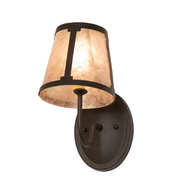 You can elevate your space with this stunning curvaceous wall sconce. Talmont features a sleek Silver Mica shade, which is perched on an Ivory faux candlelight. The wall fixture is enhanced with a curved arm and a round backplate featured in an Oil Rubbed Bronze finish. The mica shade offers a classic, tapered design that renders a handsome look and beautiful ambient illumination. This wall luminaire is ideal for use in hallways, dining areas, and living spaces in residential and hospitality settings. The Talmont Wall Sconce is part of our American-made, American-designed, handcrafted Transitional Lighting Collection, and is manufactured in Yorkville, New York. UL and cUL listed for dry and damp locations. Collection: Talmont Finish: Oil Rubbed Bronze Glass: Silver Mica Width: 6.00" Height: 11.00" Length: 9.50" Weight: 2.50 lb Number of Bulbs: 1 Maximum Wattage: 7.00 W Bulb Type: BA9 Bulb Base: E12 Light Source: LED Material: Steel Country of Origin: USA Safety Rating: Damp LED