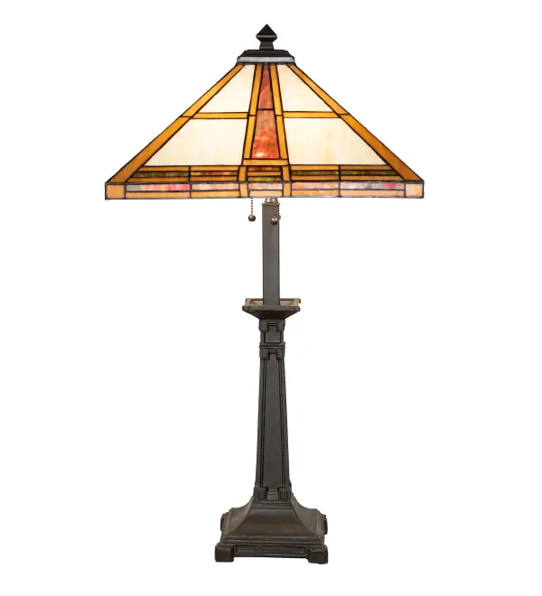 This striking Mission-style buffet lamp features a geometric-style shade with straight line designs in Golden Yellow and Beige art glass bordered with a handsome blend of Multicolored grid borders featuring Blue/Green; Red; and Amber. It is created with the famous Meyda Tiffany copperfoil construction. The lamp is complemented with a table base finished in Mahogany Bronze and features a two-pull chain on/off capabilities. The Prairie Straw Buffet Lamp is included in our American-designed; handcrafted Mission Lighting Collection. UL and cUL listed for dry locations. Each shade is a unique work of art with color variations based on natural ingredients inherent in the glass.233939