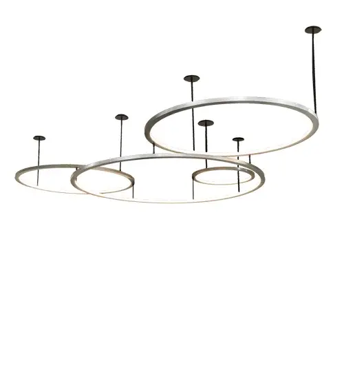 Anillo is a massive; modern; sophisticated system featuring extraordinary adjustable elements of ambient light. Our spectral halos appear to rotate; creating a stunning visual effect and breathtaking drama. This custom-configurable grouping of Brushed Stainless Steel-finished solid rings reveals Statuario Idalight diffusers and is complemented with Solar Black canopies and suspension rods. High-powered; integral LEDs deliver dimmable; robust illumination; energy savings; minimal maintenance; and long life. These eye-catching rings emit a clean glow and enhance the ambiance of the surrounding space; elevating the fixture's appeal in homes; resorts; and hotels. The Anillo Cascading Pendant is included in our American-made; American-designed; handmade Modern Lighting Collection and manufactured in Yorkville; New York. UL and cUL listed for dry and damp locations. This fixture was designed by David Singer of Arc Light Design in New York for a private residence in Texas. - alternate view