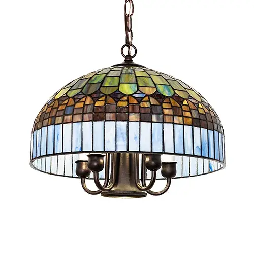 Elegant and distinctive; this Tiffany Candice pendant design features a beautiful shade with Light Blue glass fringe surrounding a brickwork of Green; Ruby; and Blue with Violet diamond-shaped accents for the look of woven fabric. The art glass shade is created using the famous Meyda Tiffany copper foil construction process and is enhanced with hardware finished in Mahogany Bronze. The pendant is paired with a premium light cluster that includes a downlight to brighten a table and eight candelabras for even illumination of the stained glass. We recommend pairing this fixture with a wall dimmer for optimal performance in your space. The overall height ranges from 15 to 49 inches; and the chain length can be easily adjusted on location to accommodate your specific lighting needs. The ceiling fixture is ideal for illuminating dining areas; entryways; and other spaces in homes; restaurants; and offices. The Tiffany Candice Pendant is included in our American-designed; handcrafted Tiffany Reproduction Lighting Collection. UL and cUL listed for dry and damp locations. Each shade is a unique work of art; featuring color variations derived from the natural ingredients inherent in the glass. - alternate view
