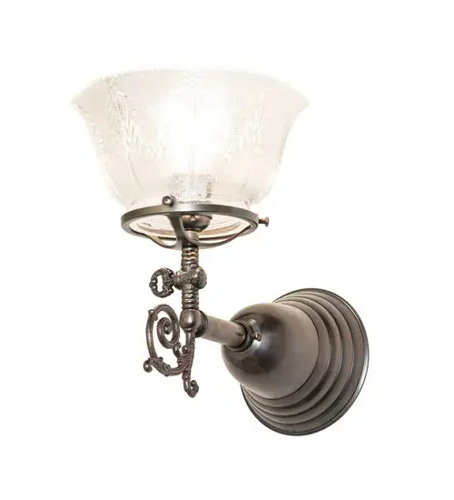 Step back in time with an elegant wall sconce featuring a traditional glass shade, fit, and finish. Reminiscent of lighting fixtures from the early 1900s, the Clear Textured Revival Glass shade boasts an authentic historic look that complements any room or space. Weathered Antique Brass finished hardware and decorative accents make this piece a timeless treasure. This stunning wall fixture is perfect for placement in corridors and dining areas in residential and hospitality settings. The Revival Gas & Electric Wall Sconce is included in our American-designed, handcrafted Revival Lighting Collection. It is UL and cUL listed for dry and damp locations. Collection: Revival Finish: Weathered Antique Brass Glass: Clear Textured Glass Width: 7.50" Height: 10.00" Length: 11.00" Weight: 3.00 lb Number of Bulbs: 1 Maximum Wattage: 60.00 W Bulb Type: A15 Bulb Base: E26 Material: Brass Country of Origin: USA Safety Rating: Damp - alternate view