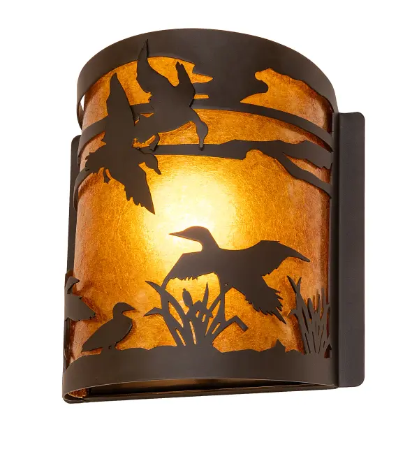 With a swoosh, a flock of Ducks climbs sunward, soaring in flight and stretching out above the marsh reeds against the sun-split sky and up towards the heavens. This charming wall sconce features a stunning Amber Mica shade, which diffuses soft, ambient illumination. The decorative accents, hardware, and frame are available in an Oil Rubbed Bronze finish. To complement this wall fixture, please look at the matching left wall sconce, model 287736. The Ducks in Flight Wall Sconces are included in our American-made, American-designed, handcrafted Wildlife Lighting Collection. The fixtures are manufactured in Yorkville, New York, and are UL and cUL listed for dry and damp locations. Upstate New York's adventurous playland, known as the Adirondack Mountains, with its many breathtaking forests, lakes, and rivers, is the spiritual birthplace of Meyda and inspires our rustic-themed mica collections. Collection: Ducks In Flight Finish: Oil Rubbed Bronze Glass: Amber Mica Width: 8.00" Height: 9.00" Length: 4.50" Weight: 2.50 lb Number of Bulbs: 1 Maximum Wattage: 60.00 W Bulb Type: A19 Bulb Base: E26 Material: Steel Country of Origin: USA Safety Rating: Damp
