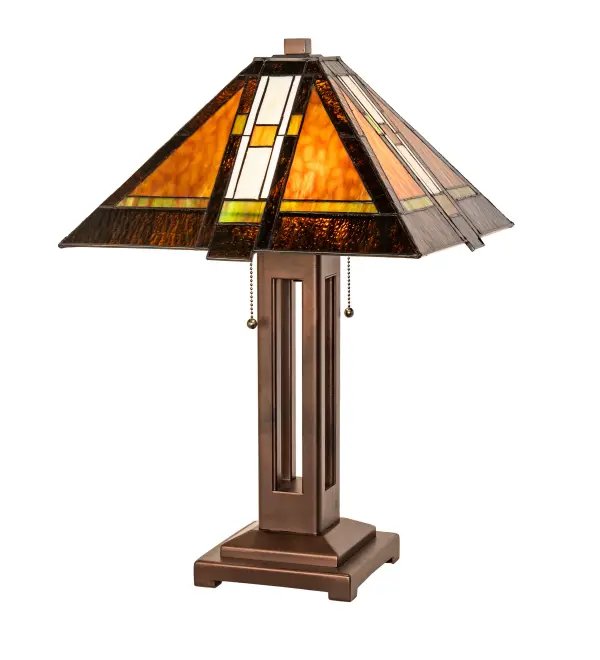 Simple; clean lines and geometric shapes are the hallmark of the Mission style. This sleek design features an elegant linear pattern in Caramel art glass with Root Beer glass trim and accented with Beige; White; and Green/Brown/Red colored glass. Hand-cut pieces of glass are wrapped in copperfoil and soldered together using the famous Meyda Tiffany construction technique to create this handsome shade. A Mahogany Bronze-finished; Mission-style table base supports the pyramid-shaped shade. The Montana Mission Table Lamp is included in our American-designed; handcrafted Mission Lighting Collection. UL and cUL listed for dry locations.
