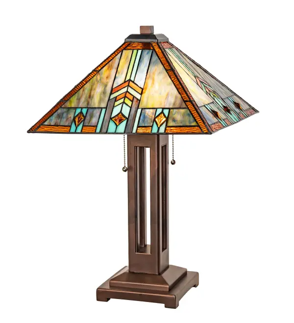 In the Prairie School of architectural style; interpreted organic objects are transformed into geometric forms. In this table lampshade; colorful interlocking blocks of multi-colored glass in hues of Blue and Green; with accent blocks of Blue and Burgundy; are used to create stylized wheat stalks on a Beige Cream background. The stained glass shade is crafted using the renowned Meyda Tiffany copperfoil construction process and accented with Mahogany Bronze finished hardware. Our American-designed; handmade Prairie Lighting Collection includes the Prairie Wheat Harvest Table Lamp. It is UL & cUL listed for dry locations. Each shade is a unique work of art; featuring color variations derived from the natural ingredients inherent in the glass.