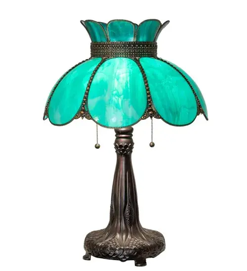 Embrace the timeless look of this classic art glass lighting design. Annabelle features a Hand-Bent Teal Art Glass Shade with Brass filigree and a decorative table base offered in a Highlighted Craftsman Brown finish to reveal an eye-catching dimensional look. The table lamp is perfect as an accent piece in a picture window and on desks and credenzas. It turns on and off with two traditional pull chains. The Anabelle Table Lamp is included in our American-made, American-designed, handcrafted Quality Bent Glass Lighting Collection and is manufactured in Yorkville, NY. It is UL and cUL listed for dry locations. Our Quality Bent Glass division is over 100 years in the making and still creating timeless masterpieces using original tools and techniques from the days when we supplied Louis Comfort Tiffany Studios. Quality Bent Glass originally revolutionized the manufacturing process for high-temperature glass formation by custom-building production capacity, glass-forming ovens, and kilns. We are one of the only remaining manufacturers of bent glass lighting and take pride in this rich heritage and expertise. Collection: Annabelle Finish: Highlighted Craftsman Brown Mahogany Bronze Glass: Teal Glass Width: 18.00" Height: 25.00" Length: 18.00" Weight: 8.50 lb Number of Bulbs: 2 Maximum Wattage: 60.00 W Bulb Type: A19 Bulb Base: E26 Material: Zinc Country of Origin: USA Safety Rating: Dry - alternate view
