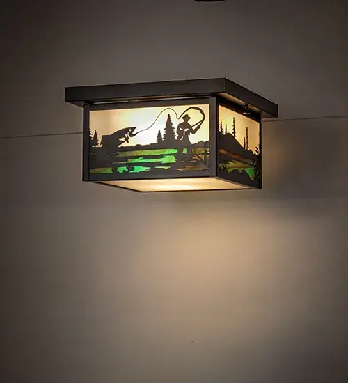 Fishing enthusiasts will delight in casting their lines for this striking lighting design; which features a Rainbow Trout leaping out of the lake as the late-morning sun rises. Soft ambient light projects through a Multicolored Art Glass shade; enhanced by a Brass frame and hardware in a Craftsman Brown finish. It is ideal for placement in hallways and dining areas; creating a beautiful design statement for log homes; timber-frame homes; and other residential and hospitality spaces. The Hyde Park Fly Fisherman Flush Mount is part of our American-made; American-designed; handcrafted Craftsman Signature Series; manufactured in Yorkville; New York. The fixture is UL and cUL listed for use in dry; damp; and wet locations. Our Build Your Own Craftsman Signature Series features unlimited combinations of styles. The collection is called Build Your Own because it is fully configurable and customizable from size and design to finish and lens color. Marine-grade; solid brass; or copper raw materials are utilized to ensure items from the Craftsman Signature Series of outdoor and indoor lighting will stand the test of time; as these premium metals are impervious to most types of oxidation. Hand- applied Patina finishes on brass and copper are sealed with a clear varnish and; over time; may require gentle maintenance; such as wax; to delay or reverse the natural living finish attributes indicative of this finishing process. Patina finishes on brass and copper provide strong resistance to fading from sun exposure; will not chip or crack; and will not rust like a steel- framed item in the same conditions. Mica is less durable in outdoor locations but may be appropriate for mildly exposed areas. Choose from many style options or send us your concept today! Call today to learn how to use the configuration tool available on our website to generate an item number instantly.