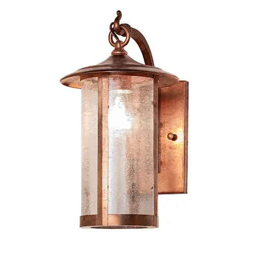Handcrafted from Solid Copper with alluring rustic beauty. This stunning Craftsman Signature lantern features a Clear Seeded Glass lens enhanced with a Raw Copper finish. Display this wall sconce to illuminate the exterior of timber homes, modern farmhouses, and other spaces. The Fulton Prime Wall Sconce is included in our American-made, American-designed, handcrafted Craftsman Signature Series, manufactured in Yorkville, New York. UL and cUL listed for dry, damp, and wet locations. Our Build You Own Craftsman Signature Series features unlimited combinations of styles. The collection is called Build Your Own because it is fully configurable and customizable from size and design to finish and lens color. Marine grade, solid brass, or copper raw materials are utilized to ensure items from the Craftsman Signature Series of outdoor and indoor lighting will stand the test of time, as these premium metals are impervious to most types of oxidation. Hand-applied Patina finishes on brass and copper are sealed with a clear varnish and over time, may require gentle maintenance, such as wax, to delay or reverse the natural living finish attributes indicative of this finishing process. Patina finishes on brass and copper provide strong resistance to fading from sun exposure, will not chip or crack, and will not rust like a steel-framed item in the same conditions. Choose from many style options, or send us your concept today! Call today to learn how to use the configuration tool available on our website for an instant item number! Collection: Fulton Finish: Raw Copper Glass: Clear Seeded Glass Width: 8.00" Height: 15.00" Length: 11.00" Weight: 4.50 lb Number of Bulbs: 1 Maximum Wattage: 60.00 W Bulb Type: A19 Bulb Base: E26 Material: Copper Country of Origin: USA Safety Rating: Wet - alternate view