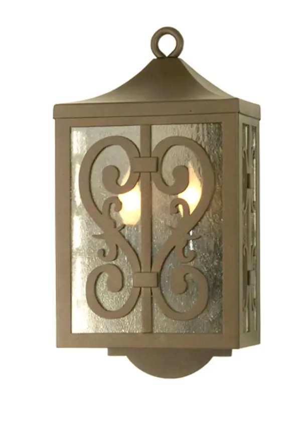 The romance of early European is represented by this handsome Flemington wall sconce, an antique reproduction featuring a Cafe Noir finish and Clear Seedy glass panels. Handcrafted by highly skilled artisans in our 180,000 square foot manufacturing facility in Yorkville, New York. Custom styles, sizes and designs available. Energy efficient lamping options such as LED are offered. UL and cUL listed for dry and damp locations. Collection: Flemington Finish: Cafe Noir Glass: Clear Seeded Glass Width: 10.00" Height: 18.50" Length: 5.00" Weight: 10.00 lb Extension from Wall: 5.00" Number of Bulbs: 2 Maximum Wattage: 60.00 W Bulb Type: B10 Bulb Base: E12 Material: Steel Country of Origin: USA Safety Listing: Dry Safety Rating: Wet