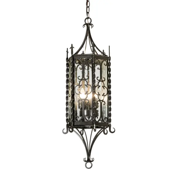A touch of warm opulence is blended with elegant Hand-Forged Iron Scrolled Metalwork; creating a stunning look. This exquisite ceiling pendant features a lovely style; showcasing a Clear Seeded Glass lens that reveals three faux candle lights and is enhanced with a Crystal Idalight bottom diffuser. The fixture is complemented by an Exterior Oil-Rubbed Bronze finish. It is ideal for providing ambient illumination in the interiors and exteriors of residential and hospitality locations. The overall height ranges from 37 to 156 inches; as the chain can be easily adjusted on location to meet your specific lighting requirements. The Cosette Pendant is featured in our American-made; American-designed; handcrafted Gothic Lighting Collection; manufactured in Yorkville; New York. It is UL and cUL listed for dry; damp; and wet locations.