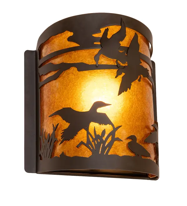 With a swoosh, a flock of Ducks climbs sunward, soaring in flight and stretching out above the marsh reeds against the sun-split sky and up towards the heavens. This charming wall sconce features a stunning Amber Mica shade, which diffuses soft, ambient illumination. The decorative accents, hardware, and frame are available in an Oil Rubbed Bronze finish. To complement this wall fixture, please look at the matching left wall sconce, model 285254. The Ducks in Flight Wall Sconces are included in our American-made, American-designed, handcrafted Wildlife Lighting Collection. The fixtures are manufactured in Yorkville, New York, and are UL and cUL listed for use in dry and damp locations. Upstate New York's adventurous playground, the Adirondack Mountains, with its many breathtaking forests, lakes, and rivers, is the spiritual birthplace of Meyda and inspires our rustic-themed mica collections. Collection: Ducks In Flight Finish: Oil Rubbed Bronze Glass: Amber Mica Width: 8.00" Height: 9.00" Length: 4.50" Weight: 2.50 lb Number of Bulbs: 1 Maximum Wattage: 60.00 W Bulb Type: A19 Bulb Base: E26 Material: Steel Country of Origin: USA Safety Rating: Damp