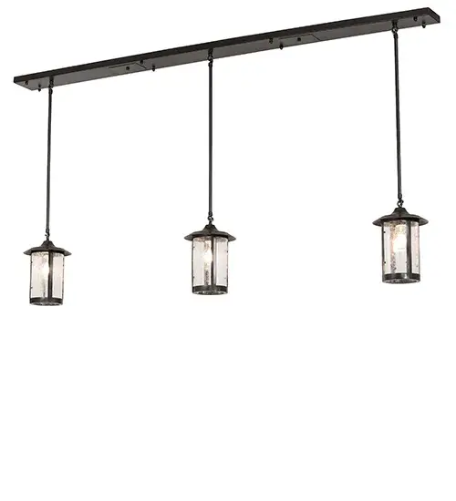 Handcrafted of solid brass with exquisite styling for interior and exterior lighting applications. Three stunning cylindrical lanterns feature a Clear Seeded Glass lens that reveals a single Edison-style lamp with a Black Patina finish. The three-light pendant is ideal for illuminating kitchen islands; counters; dining tables; and bars in timber homes; modern farmhouses; and other spaces. The Fulton Prime Mini Pendant is part of our American-made; American-designed; handcrafted Craftsman Signature Series; manufactured in Yorkville; New York. UL and cUL are listed for dry and damp locations. Our Build Your Own Craftsman Signature Series features unlimited combinations of styles. The collection is called Build Your Own because it is fully configurable and customizable from size and design to finish and lens color. Marine-grade; solid brass; or copper raw materials are utilized to ensure items from the Craftsman Signature Series of outdoor and indoor lighting will stand the test of time; as these premium metals are impervious to most types of oxidation. Hand-applied Patina finishes on brass and copper are sealed with a clear varnish and; over time; may require gentle maintenance; such as wax; to delay or reverse the natural living finish attributes indicative of this finishing process. Patina finishes on brass and copper provide strong resistance to fading from sun exposure; will not chip or crack; and will not rust like a steel-framed item in the same conditions. Choose from a variety of style options; or send us your concept today. Call today to learn how to use the configuration tool available on our website to generate an item number instantly. - alternate view