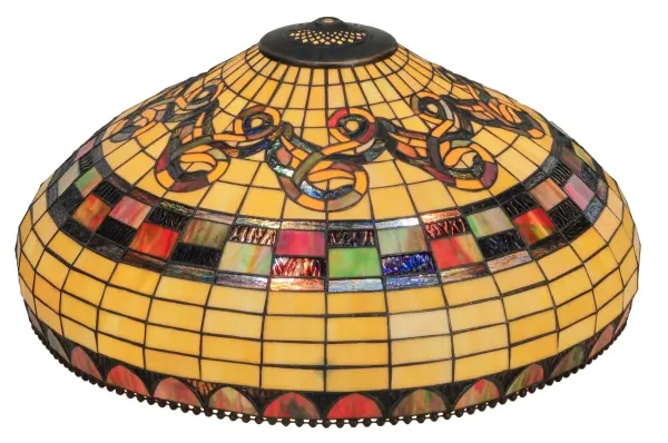 Graceful scrolls; bands and arches of Cerise streaked Moss Green art glass are accented with touches of muted Aubergine rippled glass on a Bone Beige grid in this classic Tiffany Edwardian styled shade. A metal bead circles the stained glass shade which is created using Meyda Tiffany's famous copperfoil construction.? Ideal for pairing with a base to create a charming table or floor lamp; or building a stunning ceiling or wall fixture with the appropriate hardware. The Tiffany Edwardian Pendant is included in our American designed; handcrafted Tiffany Reproduction Lighting Collection. Each shade is a unique work of art with color variations based on natural ingredients inherent in the glass. Contact us if color matching is critical when ordering multiple items.