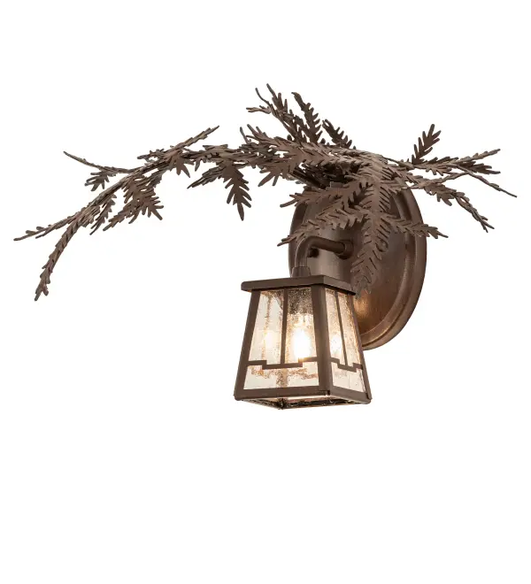 Enjoy the natural beauty of the American woodlands with this stunning wall luminaire. The solid hardware features decorative metal branches and pine needles in a Cafe Noir finish. A charming lantern showcases a lovely Clear Seeded Glass lens. The fixture can be used as a wall sconce in a hallway and other rooms in lodges, camps, and other residential and hospitality locations. The Pine Branch Valley View Wall Sconce is included in our American-made, American-designed, handcrafted Nature Inspired Collection and manufactured in Yorkville, New York. UL and cUL listed for dry and damp locations. Collection: Pine Branch Finish: Cafe Noir Glass: Clear Seeded Glass Width: 16.00" Height: 11.00" Length: 12.00" Weight: 2.50 lb Number of Bulbs: 1 Maximum Wattage: 60.00 W Bulb Type: JCD Bulb Base: G9 Material: Steel Country of Origin: USA Safety Rating: Damp