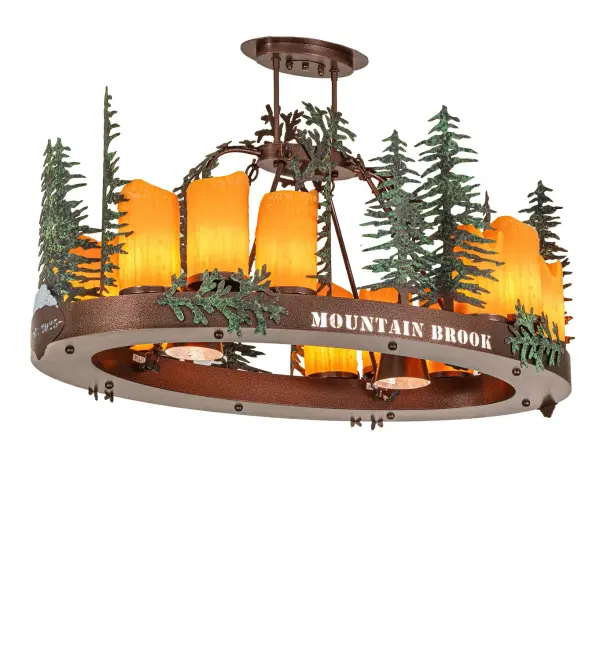 A stunning nature-inspired design. Green hand-painted Tall Pine trees stand along the perimeter of this oblong chandelier. 12 Amber candle covers diffuse ambient light beautifully, while 2 downlights provide functional lighting on surfaces below. The fixture is personalized with the laser-cut Mountain Brook name on the New Copper Vein finished frame, which illuminates with Integral LEDs. The Personalized Mountain Brook Chandelier is part of our American-made, American-designed, handcrafted Personalized Lighting Collection, manufactured in Yorkville, New York. The fixture is UL and cUL listed for dry and damp locations. This pendant can be ordered, and we will work with you to coordinate a custom logo for your project. Please call for pricing and lead times. Collection: Personalized Finish: New Copper Vein/Hand Paint Glass: Silver Mica/Amber Polyresin Width: 26.00" Height: 24.50" Length: 42.00" Weight: 65.00 lb Number of Bulbs: 12 Maximum Wattage: 25.00 W Bulb Type: BA10 Bulb Base: E12 Material: Steel Country of Origin: USA Safety Rating: Damp